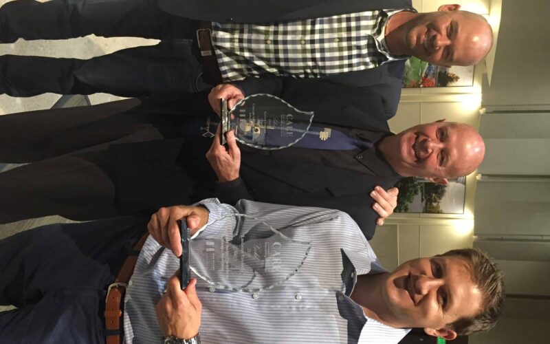Dan DeGrush right and John Buchanan with Colorado Design Consortium won a CARE Award from HBA for Landscape Remodel.