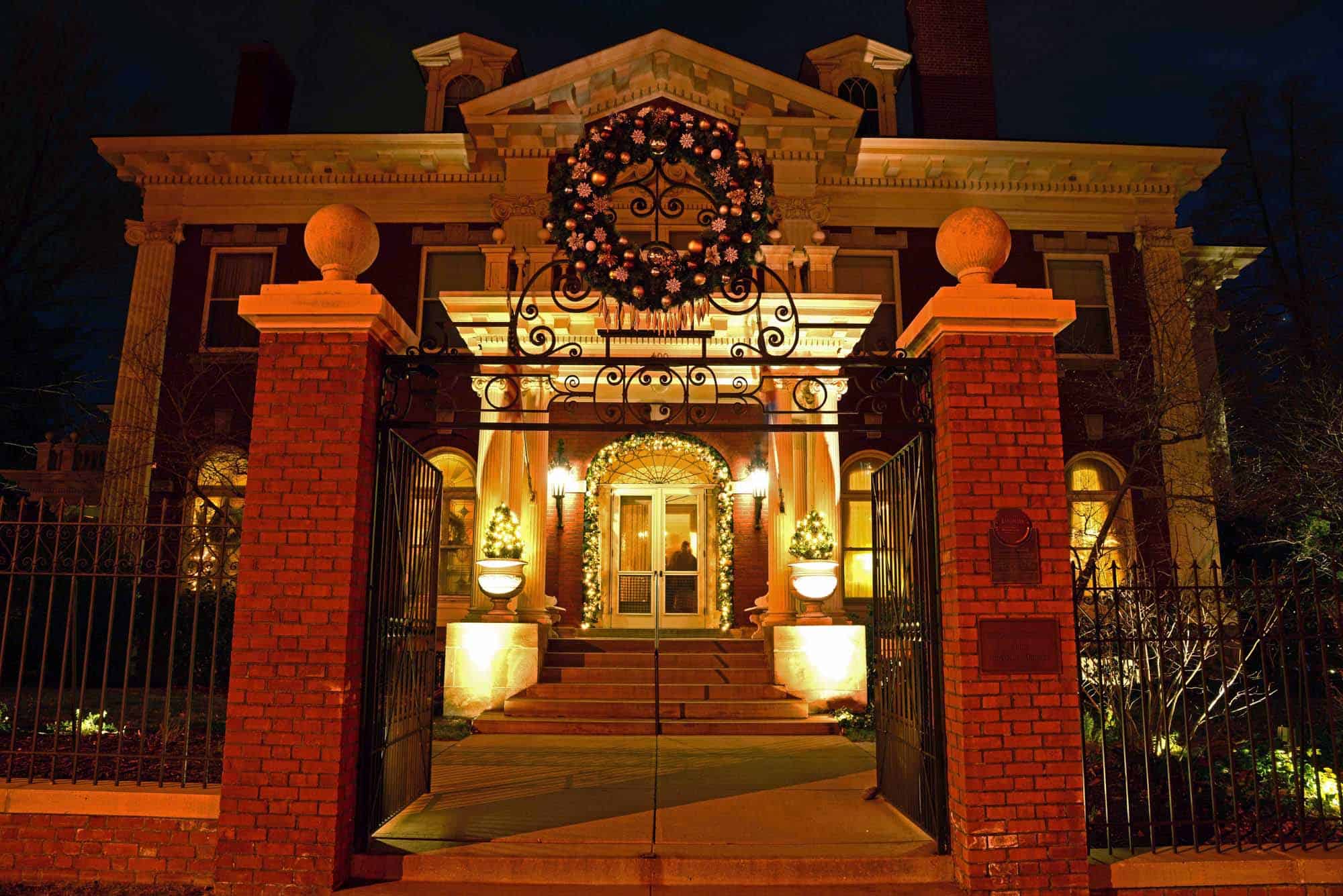 Colorado Governor's Mansion illuminated with holiday lights at night
