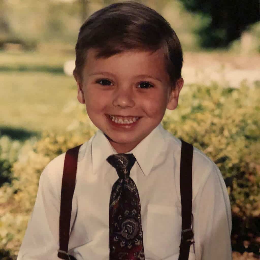 portrait of a young boy smiling