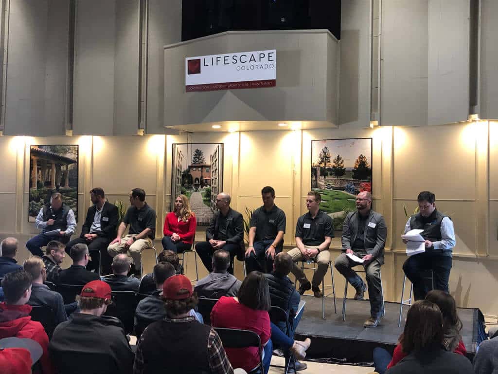 panel discussion on stage at Lifescape Colorado event