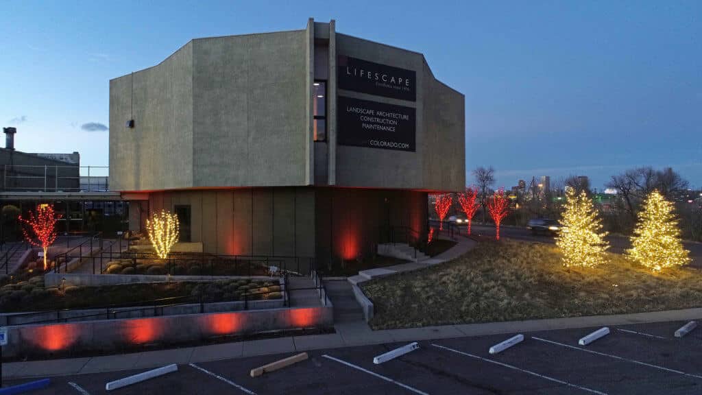 lifescape Colorado office building exterior at twilight with holiday lights
