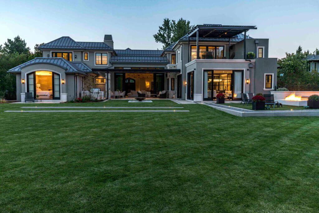 rear view of a large, modern luxury home