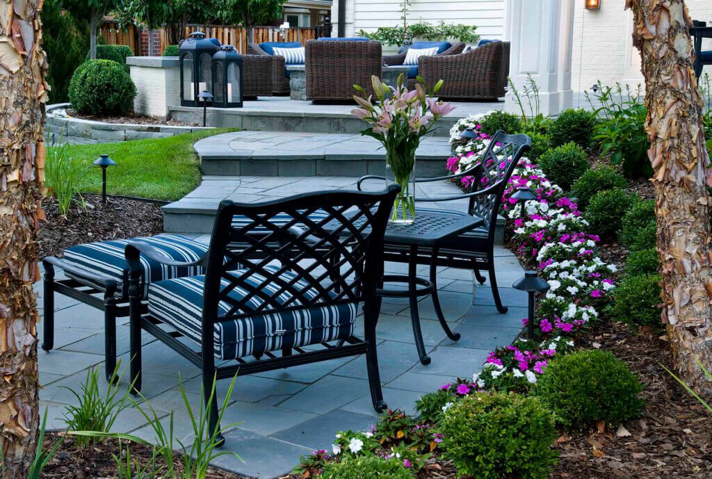 tiered stone patio with garden seating