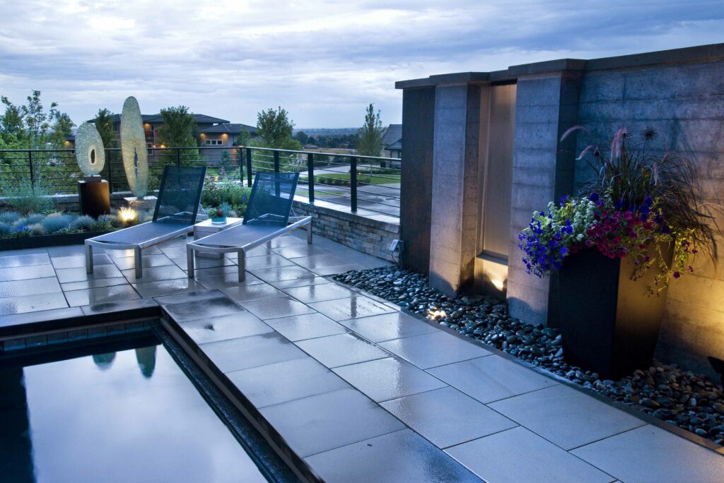 modern poolside patio with lounge chairs