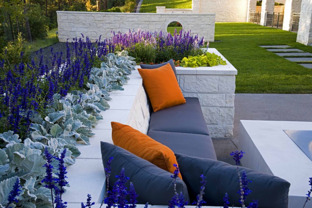 vibrant pillows accent stone outdoor seating