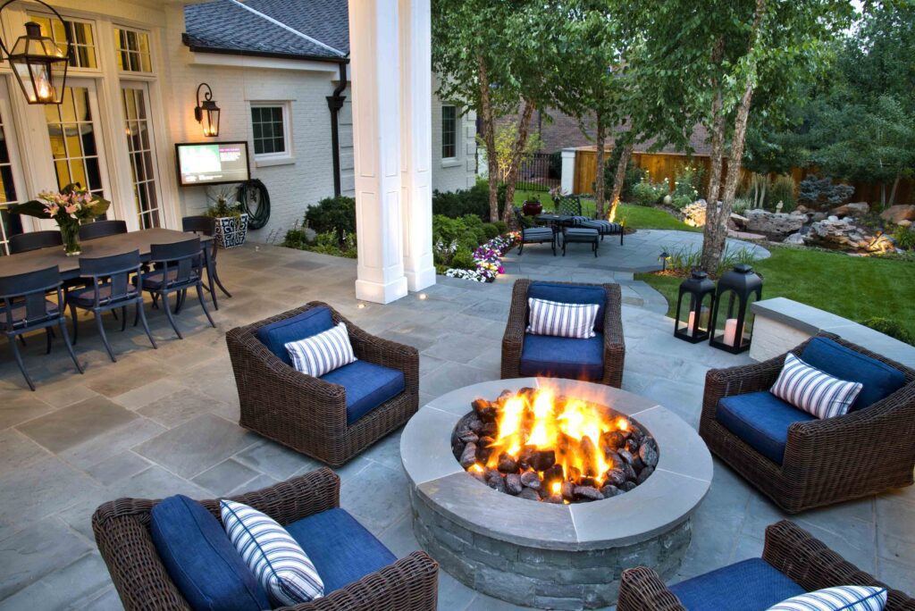 stone fire pit warms outdoor patio