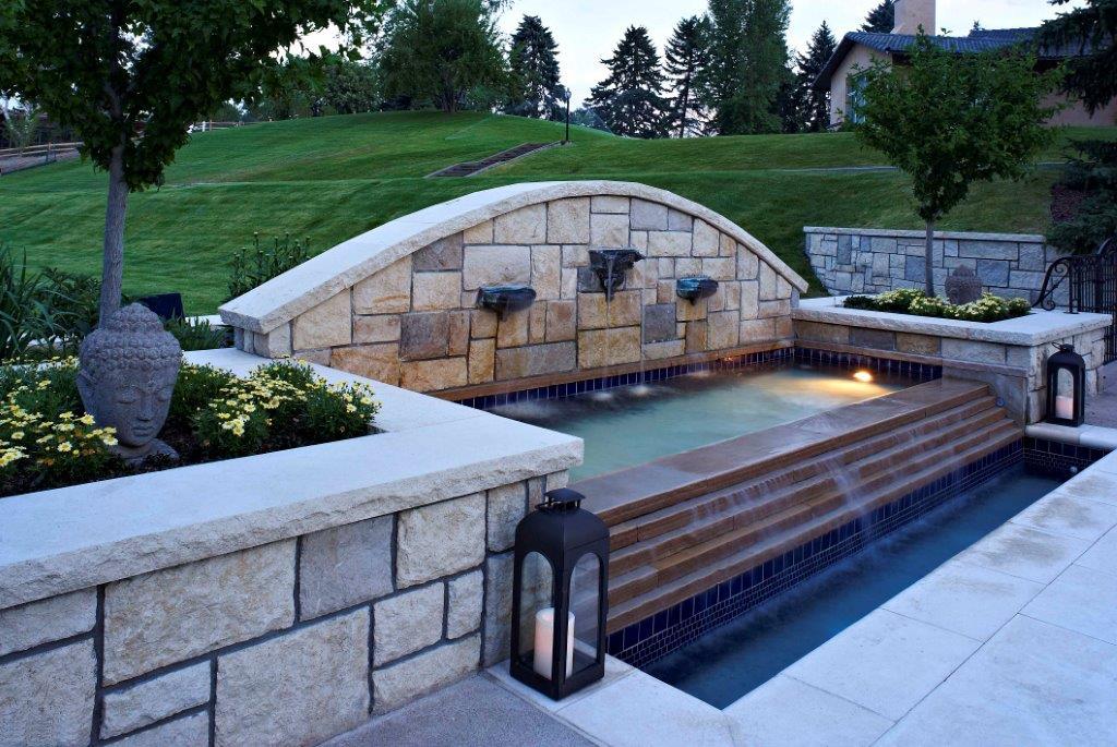 stone water feature with tiered spillways