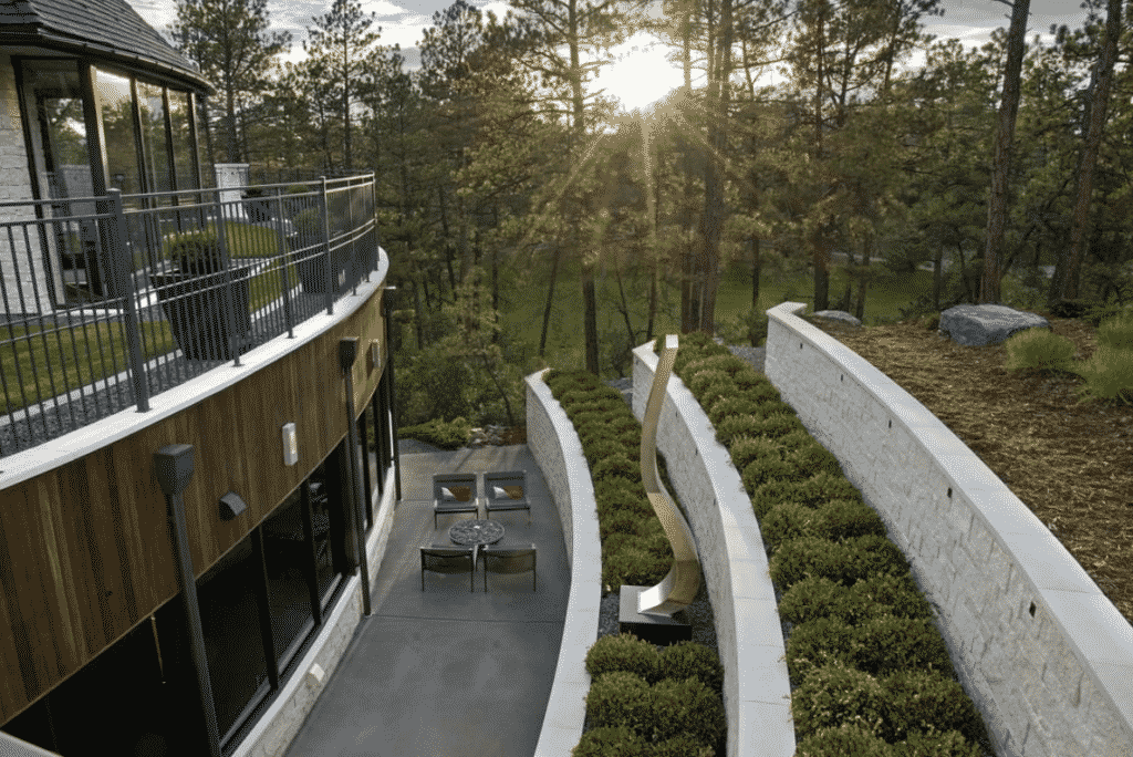 modern multi-level patio with sculpture