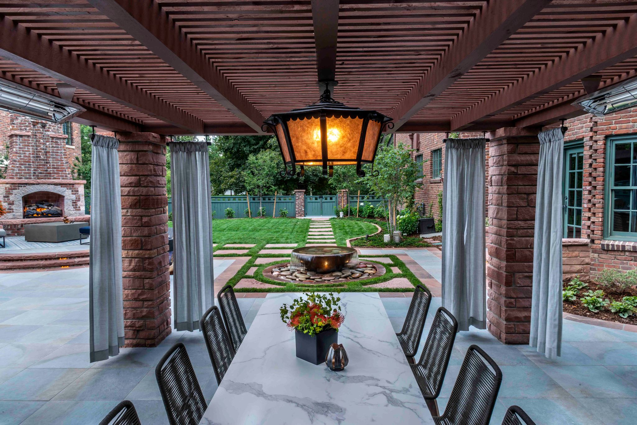 elegant dining table under wooden pergola