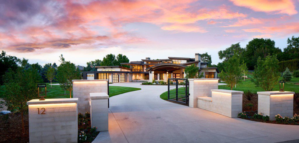 paved driveway leads to mansion