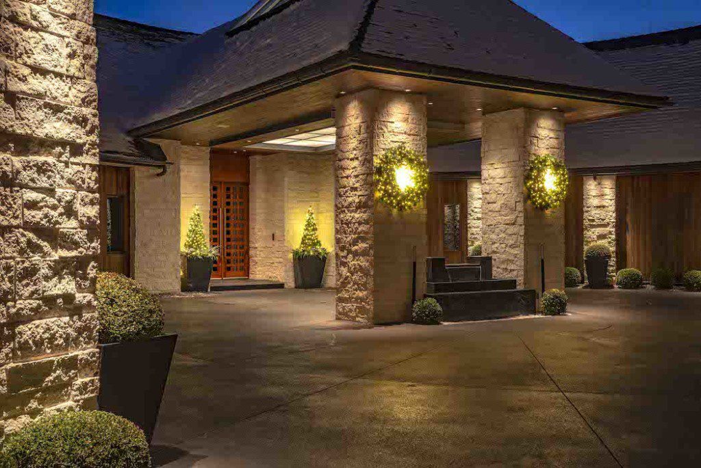 bright wreaths on stone pillars