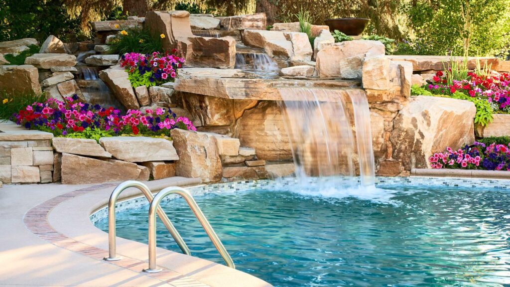 custom built hot tub and grotto waterfall installation
