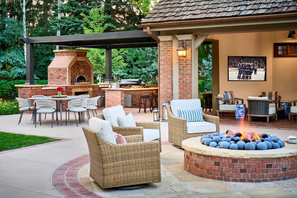custom fire pit lounge area near pool house denver