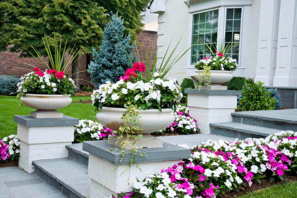 lush perennial garden planting design traditional style maintenance