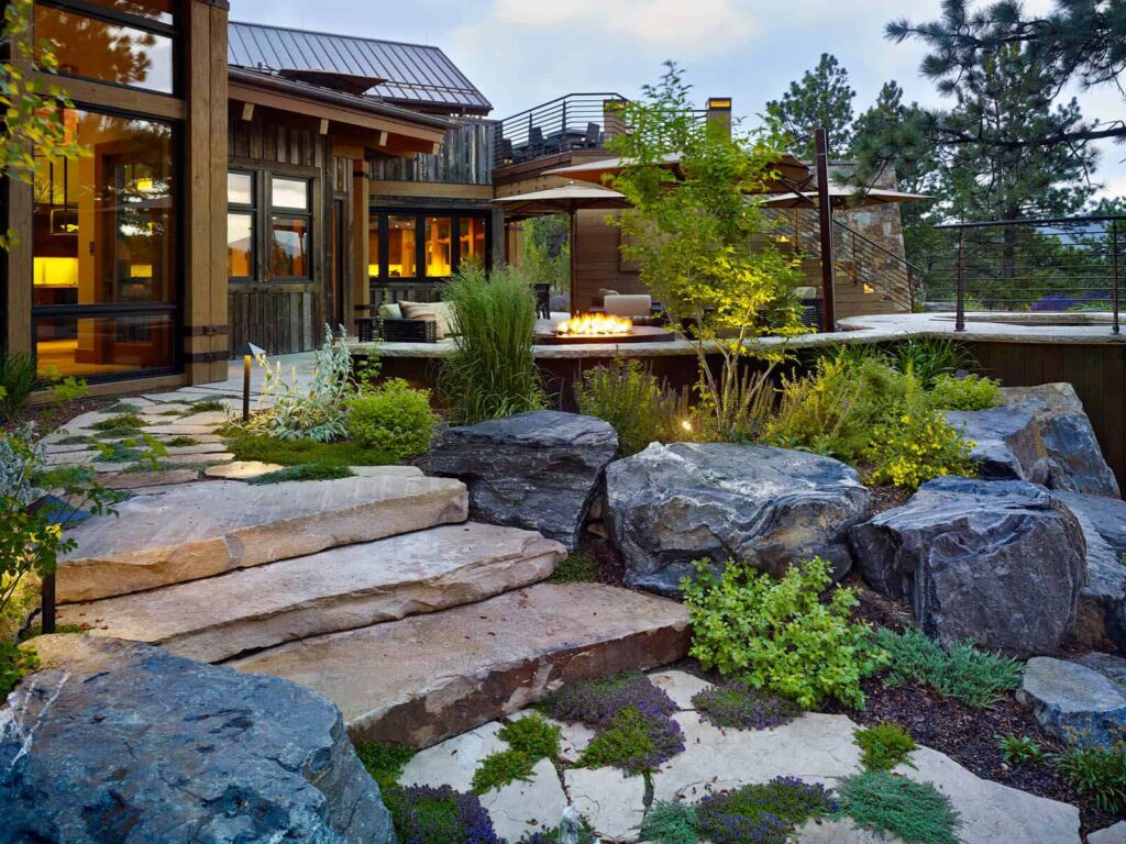 modern sloped yard retaining wall natural rock masonry