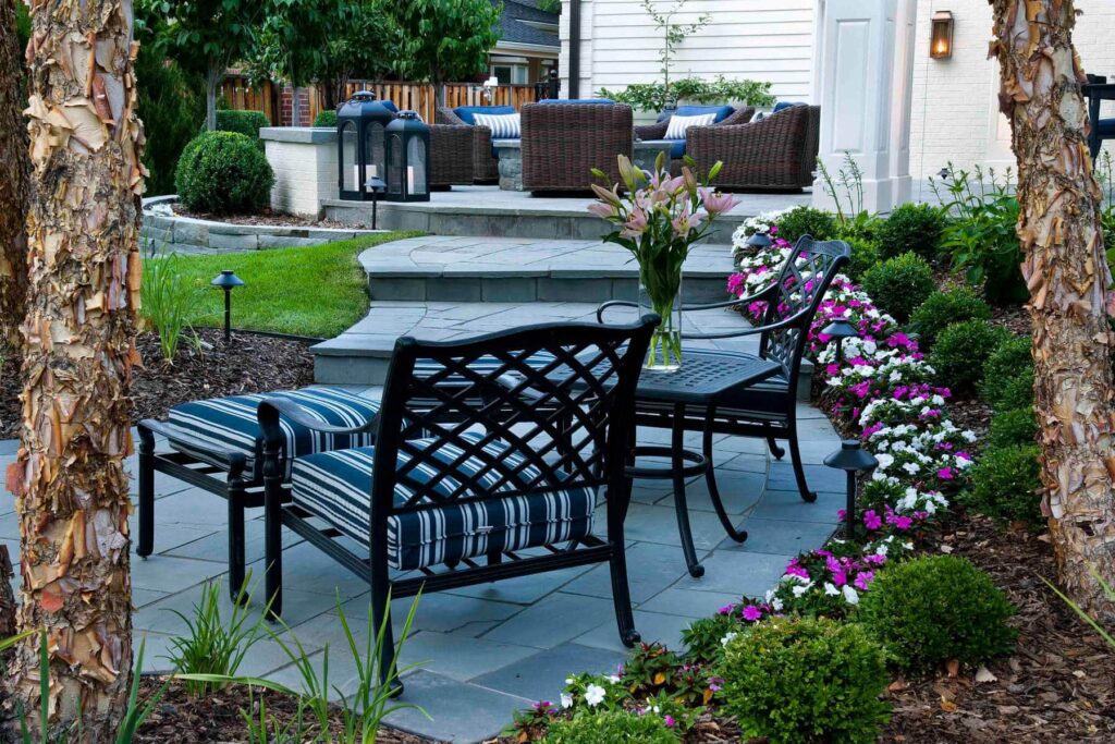 timeless outdoor living space design flagstone fireplace