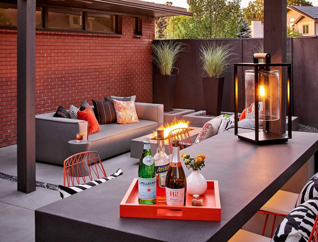 urban backyard remodel fire feature lounge area denver co