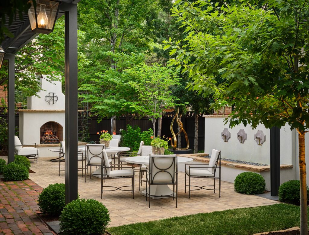 Back patio with fireplace and fountain